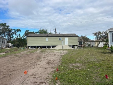 BETTER TAKE A LOOK AGAIN!  Here's your chance to own a DOUBLE on Lemon Bay Golf Club in Florida - for sale on GolfHomes.com, golf home, golf lot