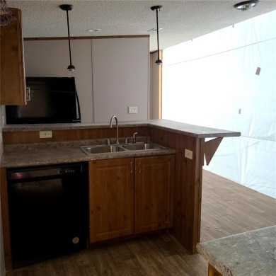 BETTER TAKE A LOOK AGAIN!  Here's your chance to own a DOUBLE on Lemon Bay Golf Club in Florida - for sale on GolfHomes.com, golf home, golf lot