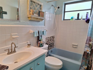 Beautiful single-story home located next to Fort Lauderdale on Fort Lauderdale Country Club in Florida - for sale on GolfHomes.com, golf home, golf lot
