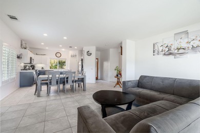 Beautifully maintained 3 bedroom, 2 bathroom home with a 2-car on Mission Lakes Country Club in California - for sale on GolfHomes.com, golf home, golf lot