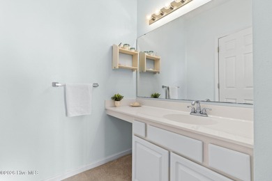 You don't want to miss out on this fully furnished 2-bed 2-bath on Sandpiper Bay Golf and Country Club in North Carolina - for sale on GolfHomes.com, golf home, golf lot