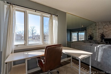 Updated 2 bedroom, 2 bath condo in the heart of Lake Ozark on Seasons Ridge At Four Seasons in Missouri - for sale on GolfHomes.com, golf home, golf lot