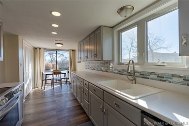 Updated 2 bedroom, 2 bath condo in the heart of Lake Ozark on Seasons Ridge At Four Seasons in Missouri - for sale on GolfHomes.com, golf home, golf lot