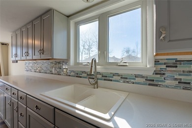 Updated 2 bedroom, 2 bath condo in the heart of Lake Ozark on Seasons Ridge At Four Seasons in Missouri - for sale on GolfHomes.com, golf home, golf lot