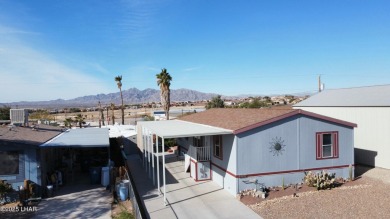 Step into this thoughtfully designed three-bedroom, two-bath on The Refuge Golf and Country Club in Arizona - for sale on GolfHomes.com, golf home, golf lot