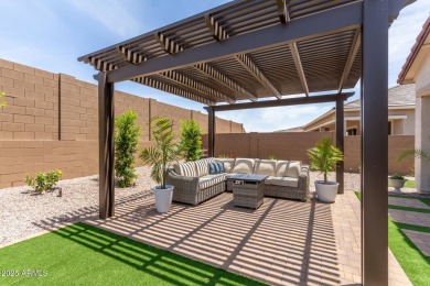 This home offers a fully landscaped backyard, upgrades on Verrado Golf Club  in Arizona - for sale on GolfHomes.com, golf home, golf lot