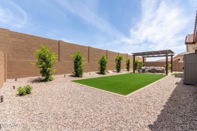 This home offers a fully landscaped backyard, upgrades on Verrado Golf Club  in Arizona - for sale on GolfHomes.com, golf home, golf lot
