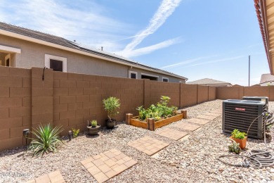 This home offers a fully landscaped backyard, upgrades on Verrado Golf Club  in Arizona - for sale on GolfHomes.com, golf home, golf lot
