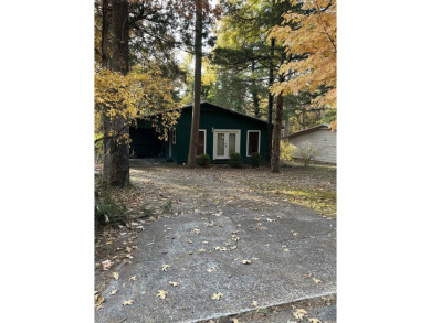 Welcome to your serene escape at Greer's Ferry Lake! This on Mountain Ranch Golf Club in Arkansas - for sale on GolfHomes.com, golf home, golf lot