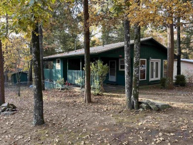 Welcome to your serene escape at Greer's Ferry Lake! This on Mountain Ranch Golf Club in Arkansas - for sale on GolfHomes.com, golf home, golf lot