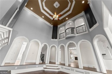 This stunning home is located in the prestigious gated section on The Golf Club of Georgia in Georgia - for sale on GolfHomes.com, golf home, golf lot