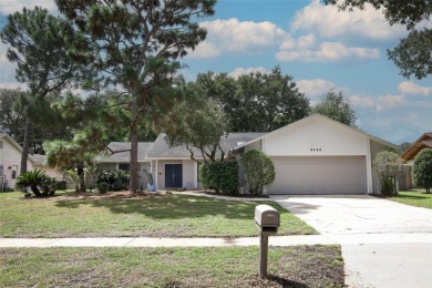Beautiful Home with huge Sparkling Screened Pool with Private on Rio Pinar Golf and Country Club in Florida - for sale on GolfHomes.com, golf home, golf lot