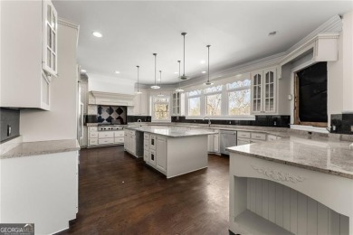 This stunning home is located in the prestigious gated section on The Golf Club of Georgia in Georgia - for sale on GolfHomes.com, golf home, golf lot