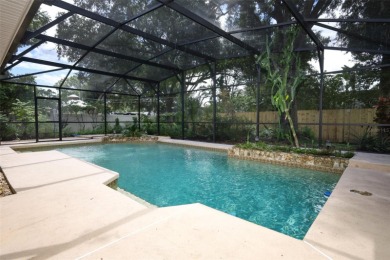 Beautiful Home with huge Sparkling Screened Pool with Private on Rio Pinar Golf and Country Club in Florida - for sale on GolfHomes.com, golf home, golf lot