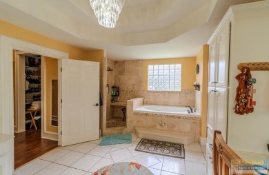 Tucked along the fairway in Rancho Escondido, this 4,037 sq ft on Rancho Viejo Resort and Country Club in Texas - for sale on GolfHomes.com, golf home, golf lot