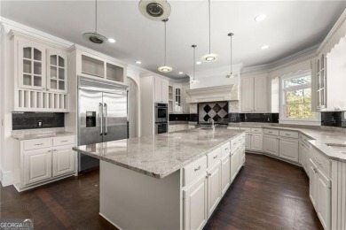 This stunning home is located in the prestigious gated section on The Golf Club of Georgia in Georgia - for sale on GolfHomes.com, golf home, golf lot