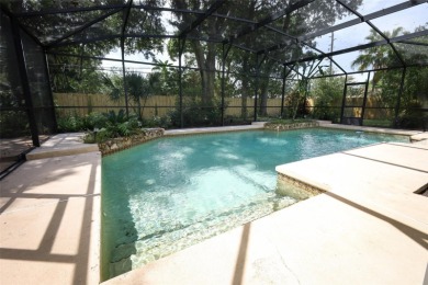 Beautiful Home with huge Sparkling Screened Pool with Private on Rio Pinar Golf and Country Club in Florida - for sale on GolfHomes.com, golf home, golf lot