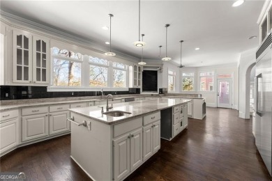 This stunning home is located in the prestigious gated section on The Golf Club of Georgia in Georgia - for sale on GolfHomes.com, golf home, golf lot