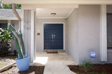 Beautiful Home with huge Sparkling Screened Pool with Private on Rio Pinar Golf and Country Club in Florida - for sale on GolfHomes.com, golf home, golf lot