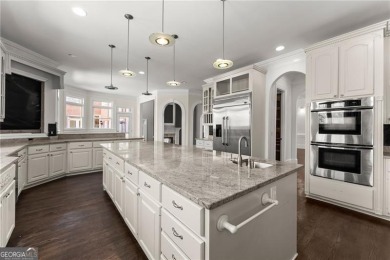 This stunning home is located in the prestigious gated section on The Golf Club of Georgia in Georgia - for sale on GolfHomes.com, golf home, golf lot
