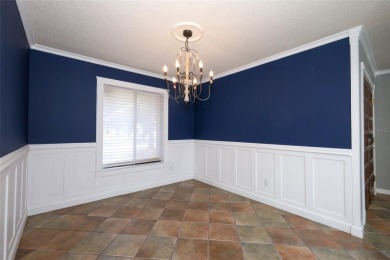 Beautiful Home with huge Sparkling Screened Pool with Private on Rio Pinar Golf and Country Club in Florida - for sale on GolfHomes.com, golf home, golf lot