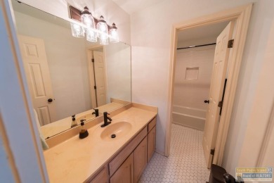 Tucked along the fairway in Rancho Escondido, this 4,037 sq ft on Rancho Viejo Resort and Country Club in Texas - for sale on GolfHomes.com, golf home, golf lot