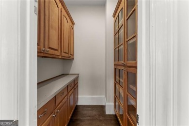 This stunning home is located in the prestigious gated section on The Golf Club of Georgia in Georgia - for sale on GolfHomes.com, golf home, golf lot