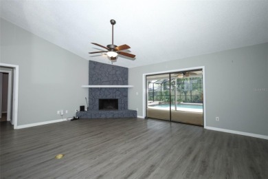 Beautiful Home with huge Sparkling Screened Pool with Private on Rio Pinar Golf and Country Club in Florida - for sale on GolfHomes.com, golf home, golf lot