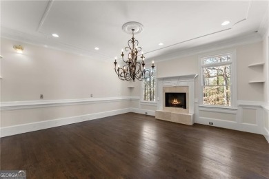 This stunning home is located in the prestigious gated section on The Golf Club of Georgia in Georgia - for sale on GolfHomes.com, golf home, golf lot