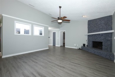 Beautiful Home with huge Sparkling Screened Pool with Private on Rio Pinar Golf and Country Club in Florida - for sale on GolfHomes.com, golf home, golf lot