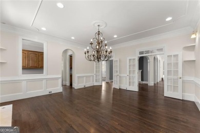 This stunning home is located in the prestigious gated section on The Golf Club of Georgia in Georgia - for sale on GolfHomes.com, golf home, golf lot