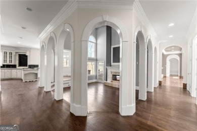 This stunning home is located in the prestigious gated section on The Golf Club of Georgia in Georgia - for sale on GolfHomes.com, golf home, golf lot