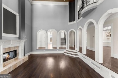This stunning home is located in the prestigious gated section on The Golf Club of Georgia in Georgia - for sale on GolfHomes.com, golf home, golf lot