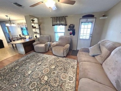 Discover this beautifully maintained 2-bedroom, 2-bathroom home on Crystal Lake Club in Florida - for sale on GolfHomes.com, golf home, golf lot