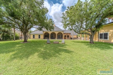 Tucked along the fairway in Rancho Escondido, this 4,037 sq ft on Rancho Viejo Resort and Country Club in Texas - for sale on GolfHomes.com, golf home, golf lot