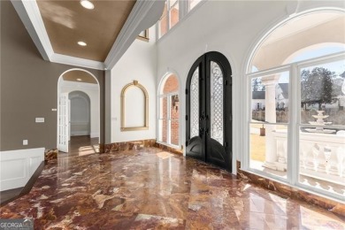 This stunning home is located in the prestigious gated section on The Golf Club of Georgia in Georgia - for sale on GolfHomes.com, golf home, golf lot
