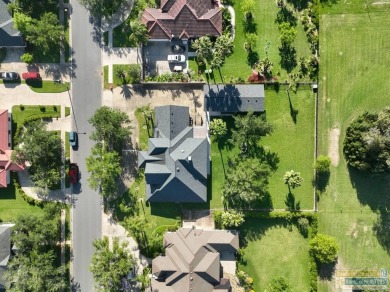 Tucked along the fairway in Rancho Escondido, this 4,037 sq ft on Rancho Viejo Resort and Country Club in Texas - for sale on GolfHomes.com, golf home, golf lot