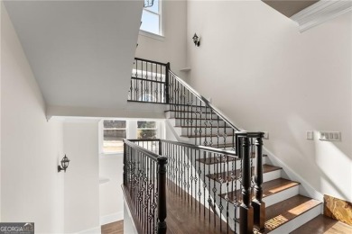 This stunning home is located in the prestigious gated section on The Golf Club of Georgia in Georgia - for sale on GolfHomes.com, golf home, golf lot