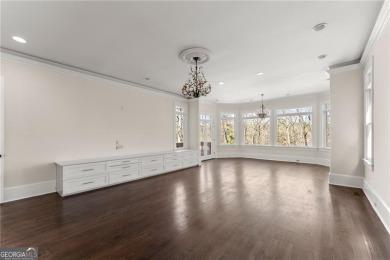 This stunning home is located in the prestigious gated section on The Golf Club of Georgia in Georgia - for sale on GolfHomes.com, golf home, golf lot