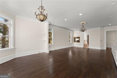 This stunning home is located in the prestigious gated section on The Golf Club of Georgia in Georgia - for sale on GolfHomes.com, golf home, golf lot