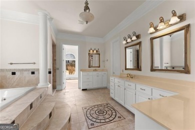 This stunning home is located in the prestigious gated section on The Golf Club of Georgia in Georgia - for sale on GolfHomes.com, golf home, golf lot