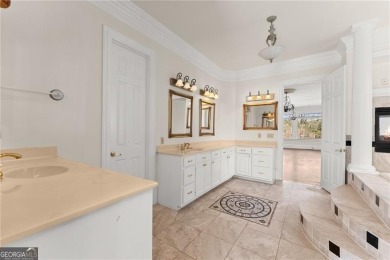 This stunning home is located in the prestigious gated section on The Golf Club of Georgia in Georgia - for sale on GolfHomes.com, golf home, golf lot