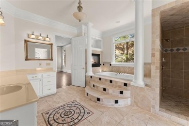 This stunning home is located in the prestigious gated section on The Golf Club of Georgia in Georgia - for sale on GolfHomes.com, golf home, golf lot