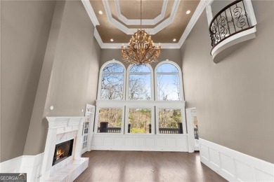 This stunning home is located in the prestigious gated section on The Golf Club of Georgia in Georgia - for sale on GolfHomes.com, golf home, golf lot