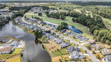 1829 Wood Stork Drive, a beautiful 4-bedroom, 3-bathroom home on Wild Wing Plantation in South Carolina - for sale on GolfHomes.com, golf home, golf lot