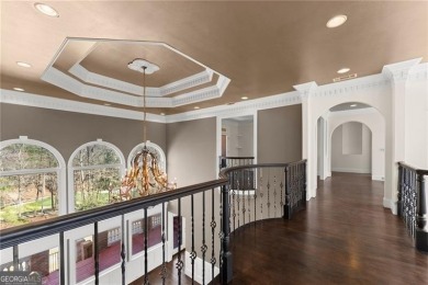 This stunning home is located in the prestigious gated section on The Golf Club of Georgia in Georgia - for sale on GolfHomes.com, golf home, golf lot