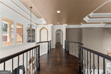 This stunning home is located in the prestigious gated section on The Golf Club of Georgia in Georgia - for sale on GolfHomes.com, golf home, golf lot