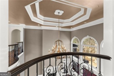 This stunning home is located in the prestigious gated section on The Golf Club of Georgia in Georgia - for sale on GolfHomes.com, golf home, golf lot