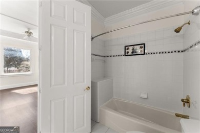 This stunning home is located in the prestigious gated section on The Golf Club of Georgia in Georgia - for sale on GolfHomes.com, golf home, golf lot