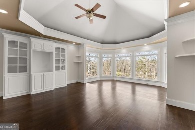 This stunning home is located in the prestigious gated section on The Golf Club of Georgia in Georgia - for sale on GolfHomes.com, golf home, golf lot